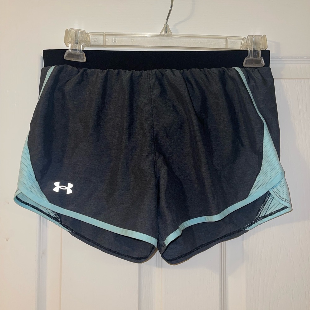 Grey Size Medium UnderArmour loose running shorts with a mint colored outline!